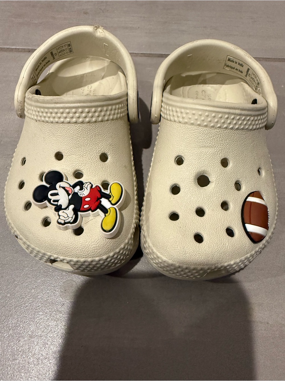 CROCS Kids Cream Clog Sandals with Mickey & Football Charms